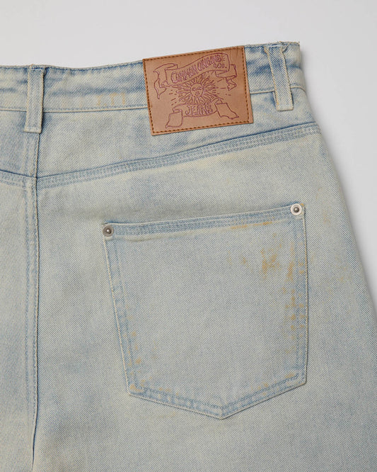 COOR STRAIGHT CUT SAND WASHED JEANS